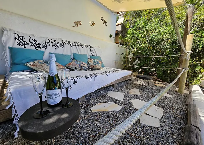 Boutique Villa Ibiza Family retreat private pool, garden under palms Cala Llena